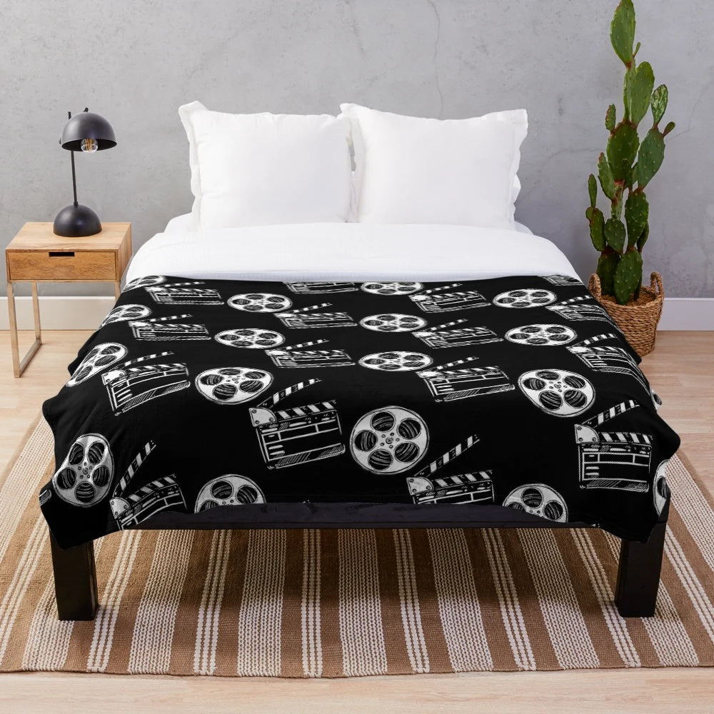 Clapperboard plush blanket featuring movie-themed design