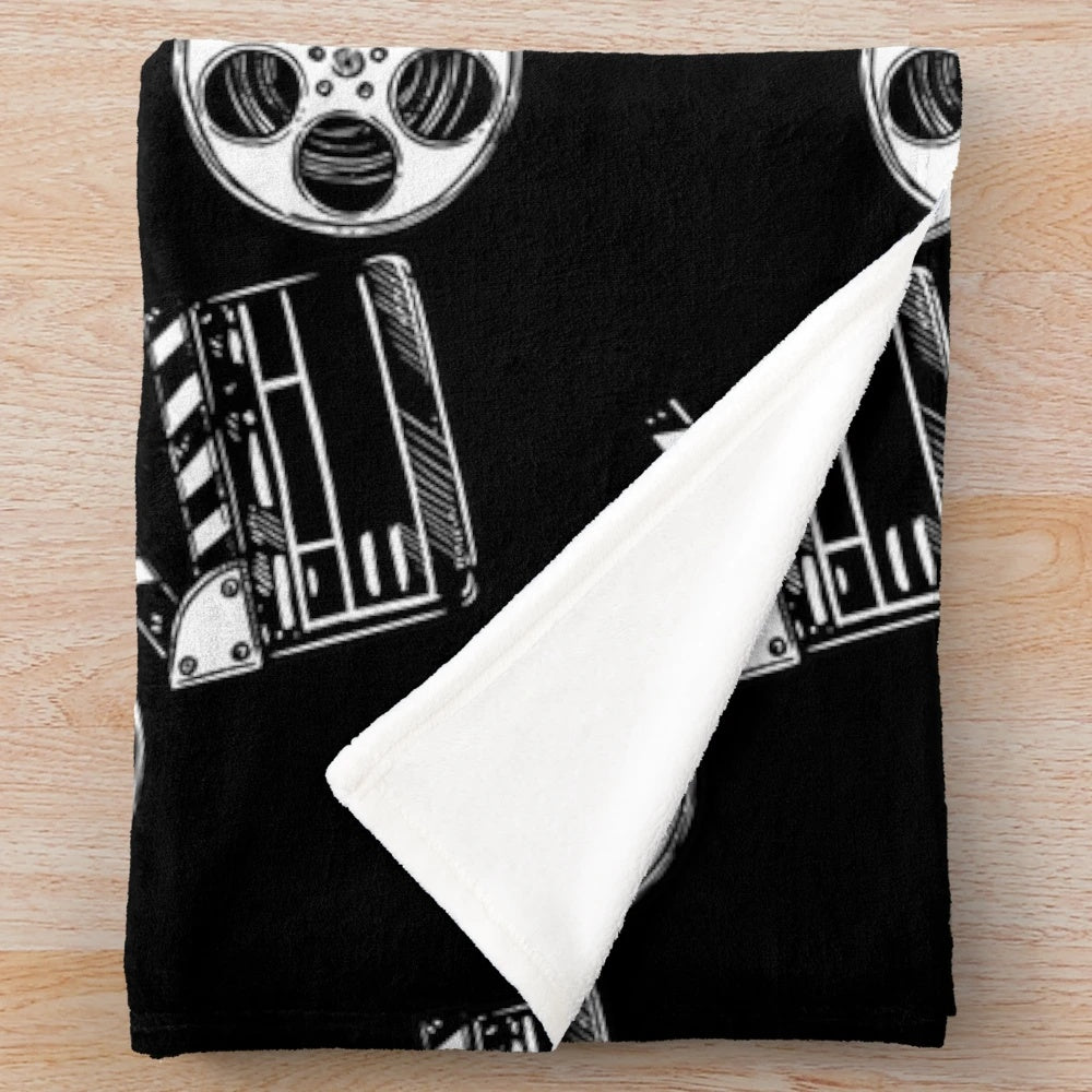 Clapperboard plush blanket featuring movie-themed design