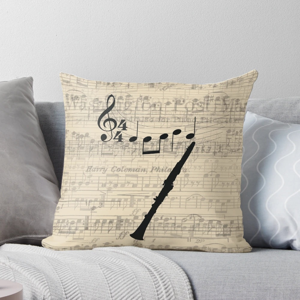 Clarinet-shaped pillow with sheet music design, perfect for musicians and music lovers.
