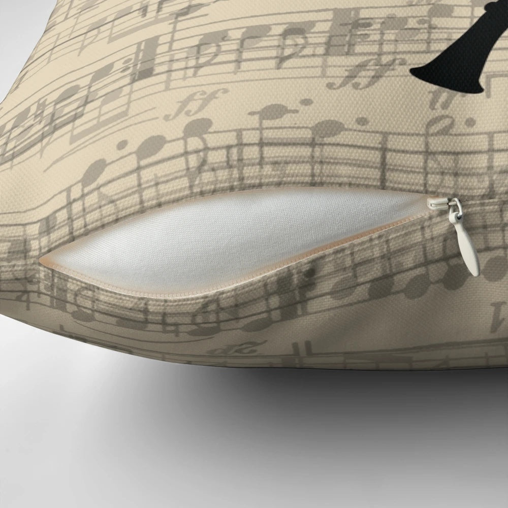 Clarinet-shaped pillow with sheet music design, perfect for musicians and music lovers.