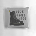 A plush Doc Martens inspired pillow with the iconic black and yellow stitching design.
