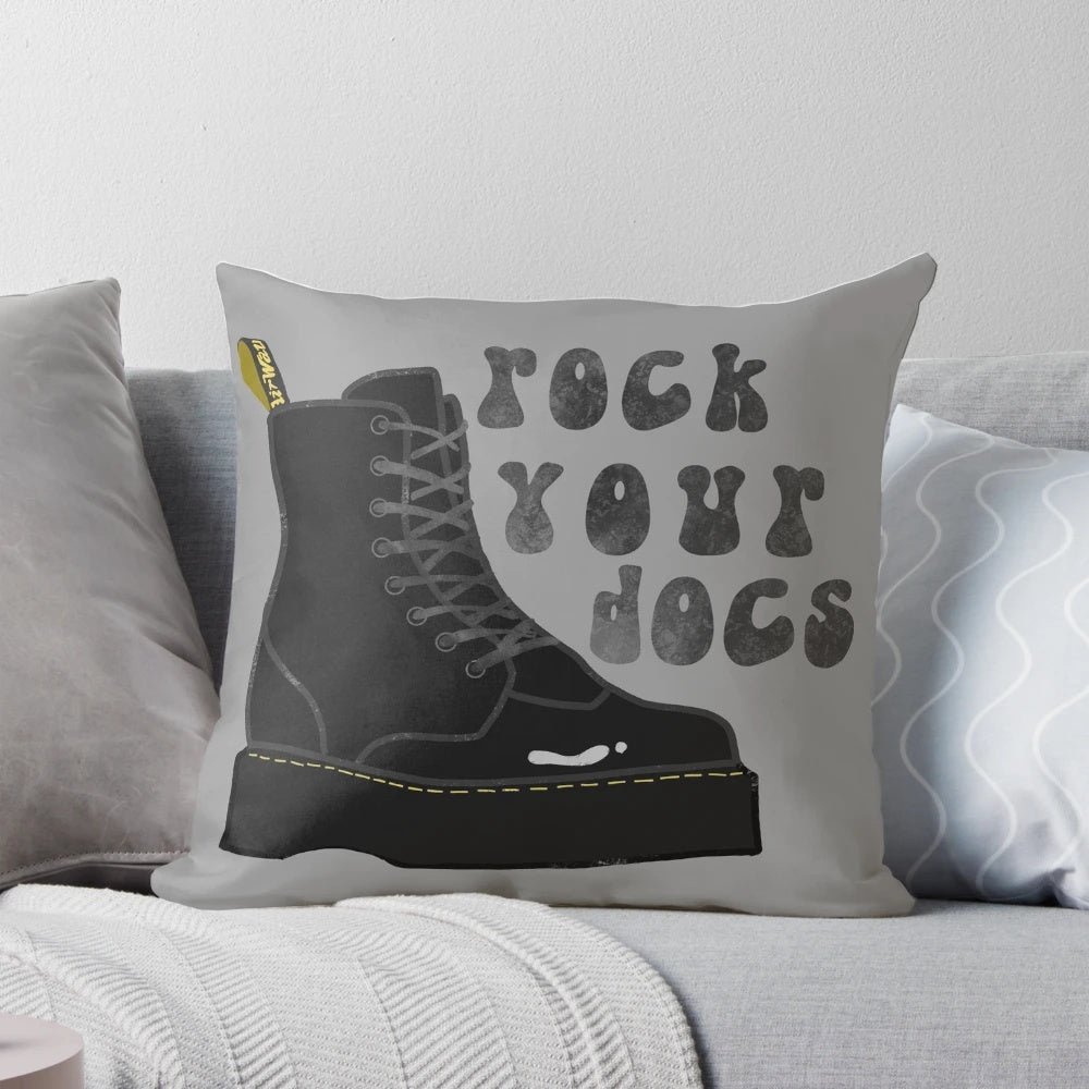 A plush Doc Martens inspired pillow with the iconic black and yellow stitching design.