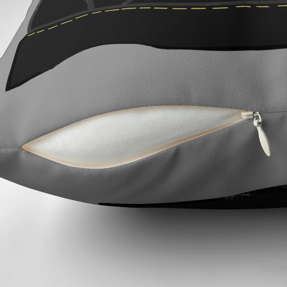A plush Doc Martens inspired pillow with the iconic black and yellow stitching design.
