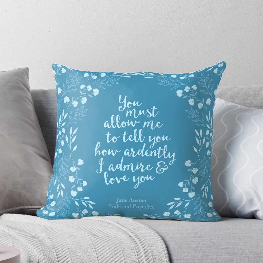 A floral pillow featuring a quote from Jane Austen's Pride and Prejudice, perfect for bookworms and literary enthusiasts.