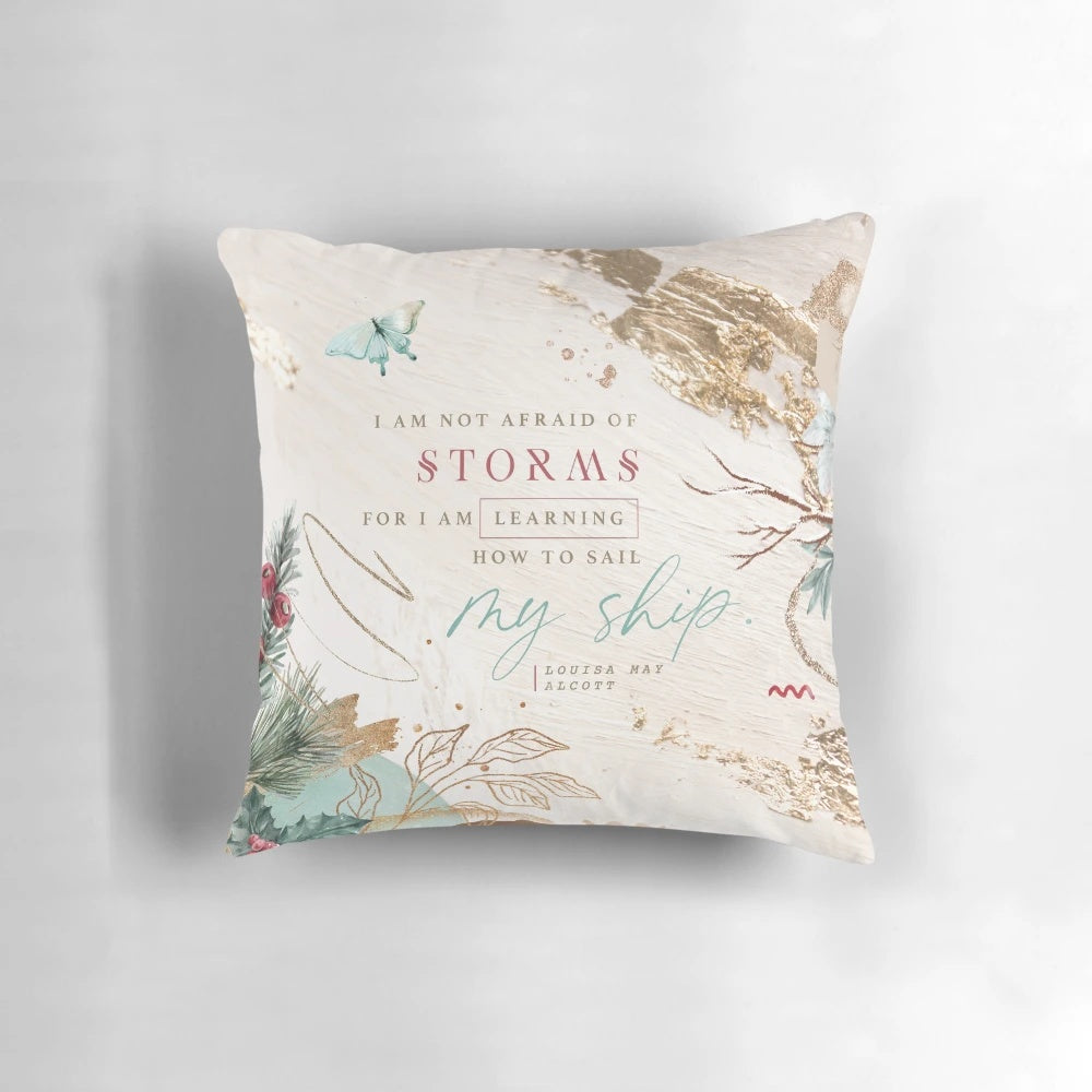 A beautiful literary pillow featuring the quote "I am not afraid of storms" from the classic novel Little Women.