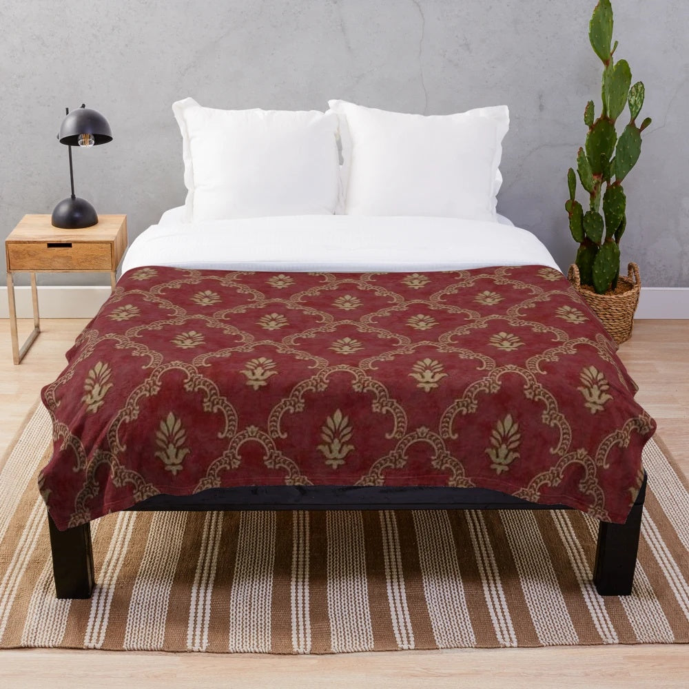Classic red and gold plush blanket with a vintage style