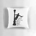A cozy pillow featuring the iconic "Singing in the Rain" scene, with Gene Kelly and a glorious feeling.