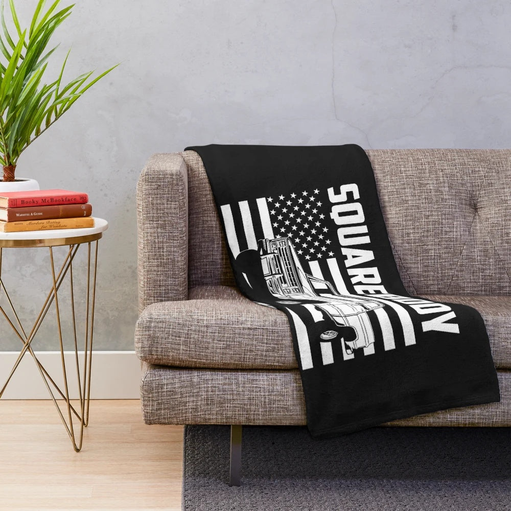 Cozy plush blanket featuring a classic squarebody pickup truck design