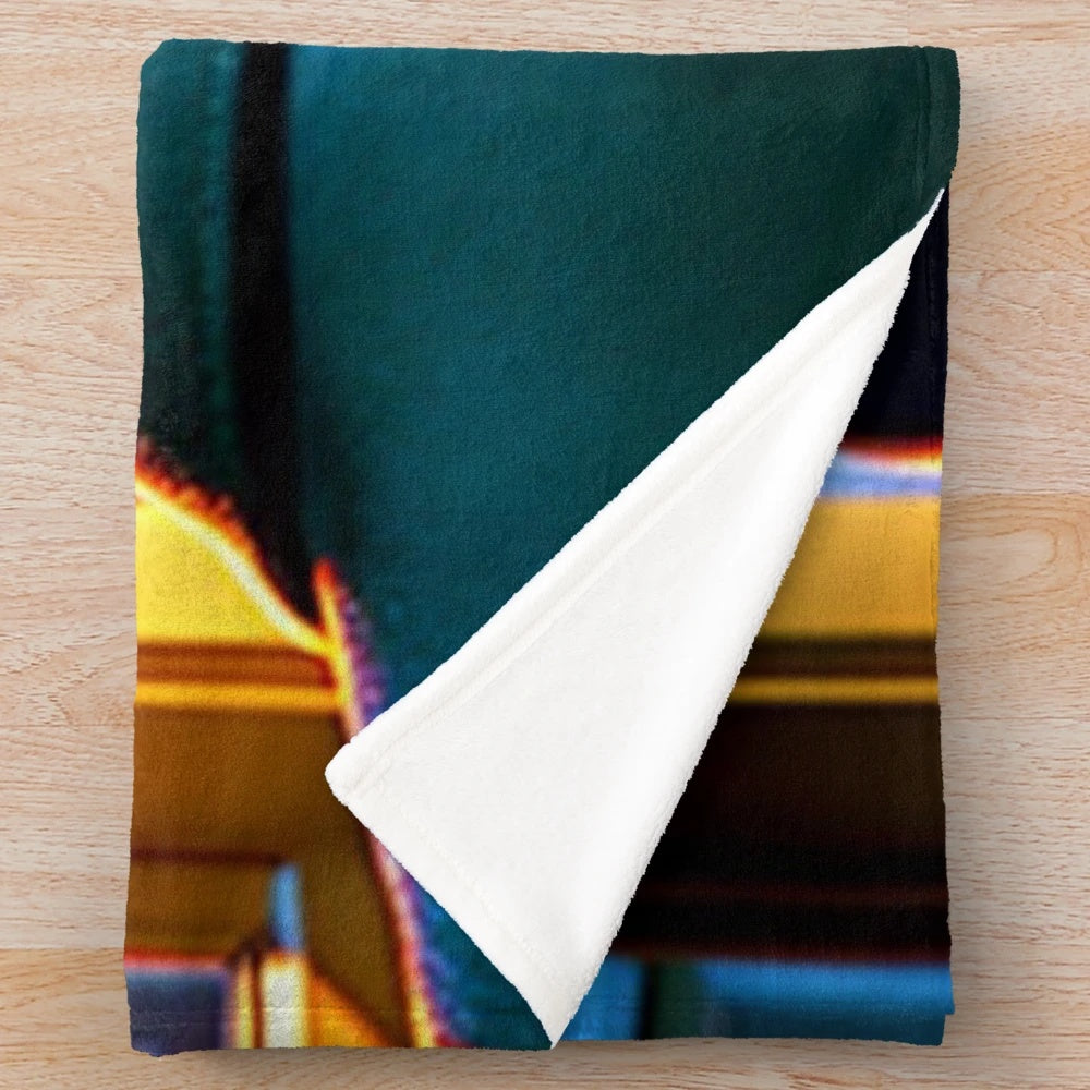 Plush blanket featuring "Rear Window" film imagery and Hitchcock-inspired binoculars