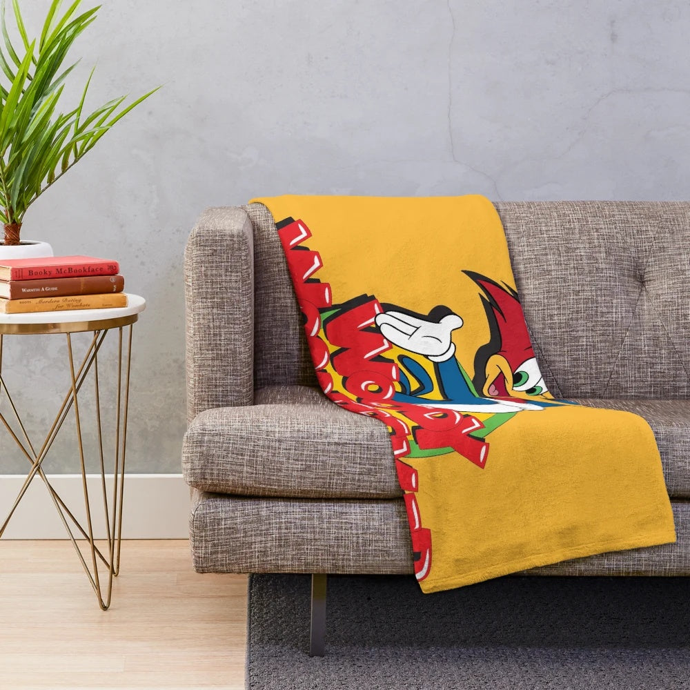 Vintage Woody Woodpecker plush blanket in yellow and black