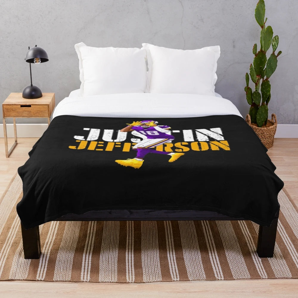 Soft and cozy plush blanket featuring Justin Jefferson's name and signature