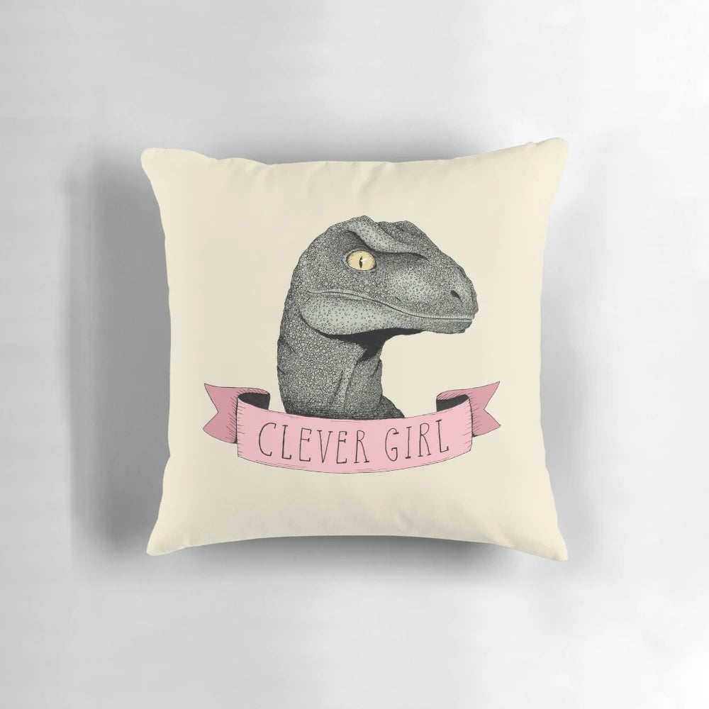 Clever Girl raptor dinosaur throw pillow with pink, pastel colors and vintage movie quote design