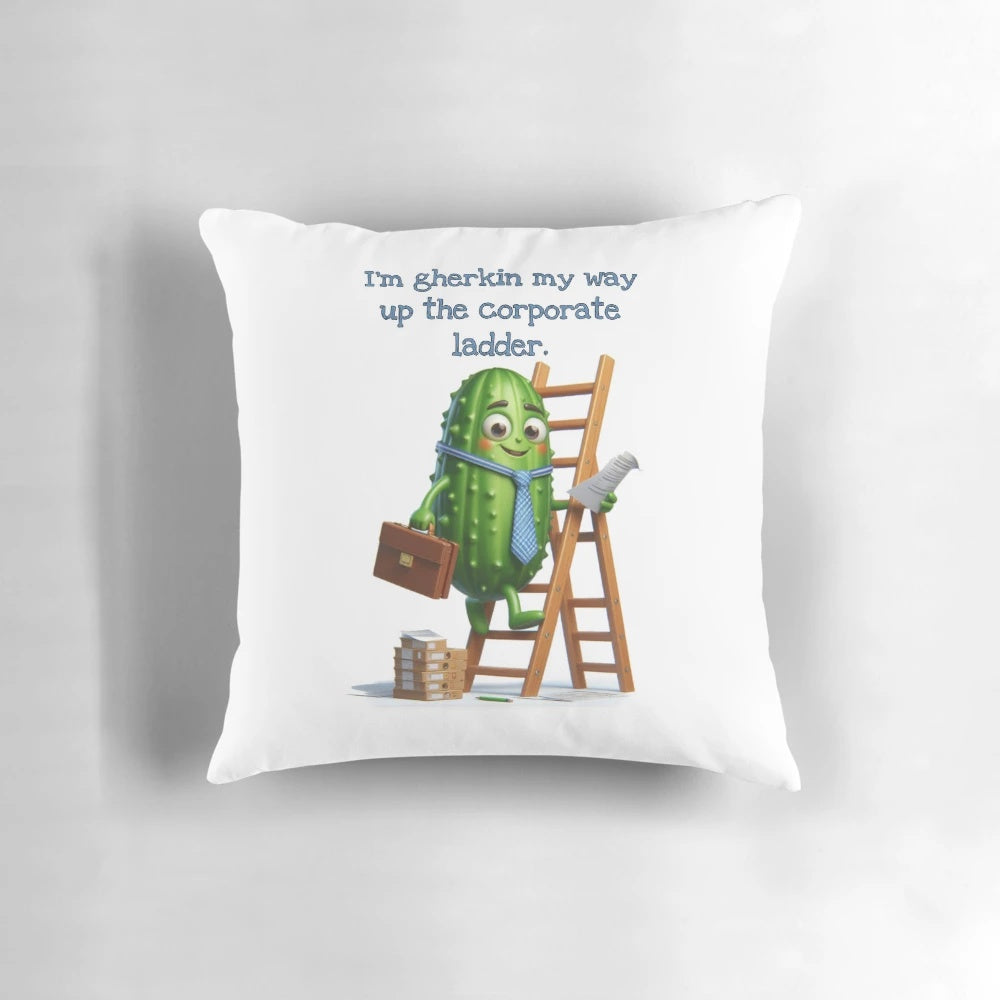 Gherkin-shaped pillow with text "I'm gherkin my way up the corporate ladder