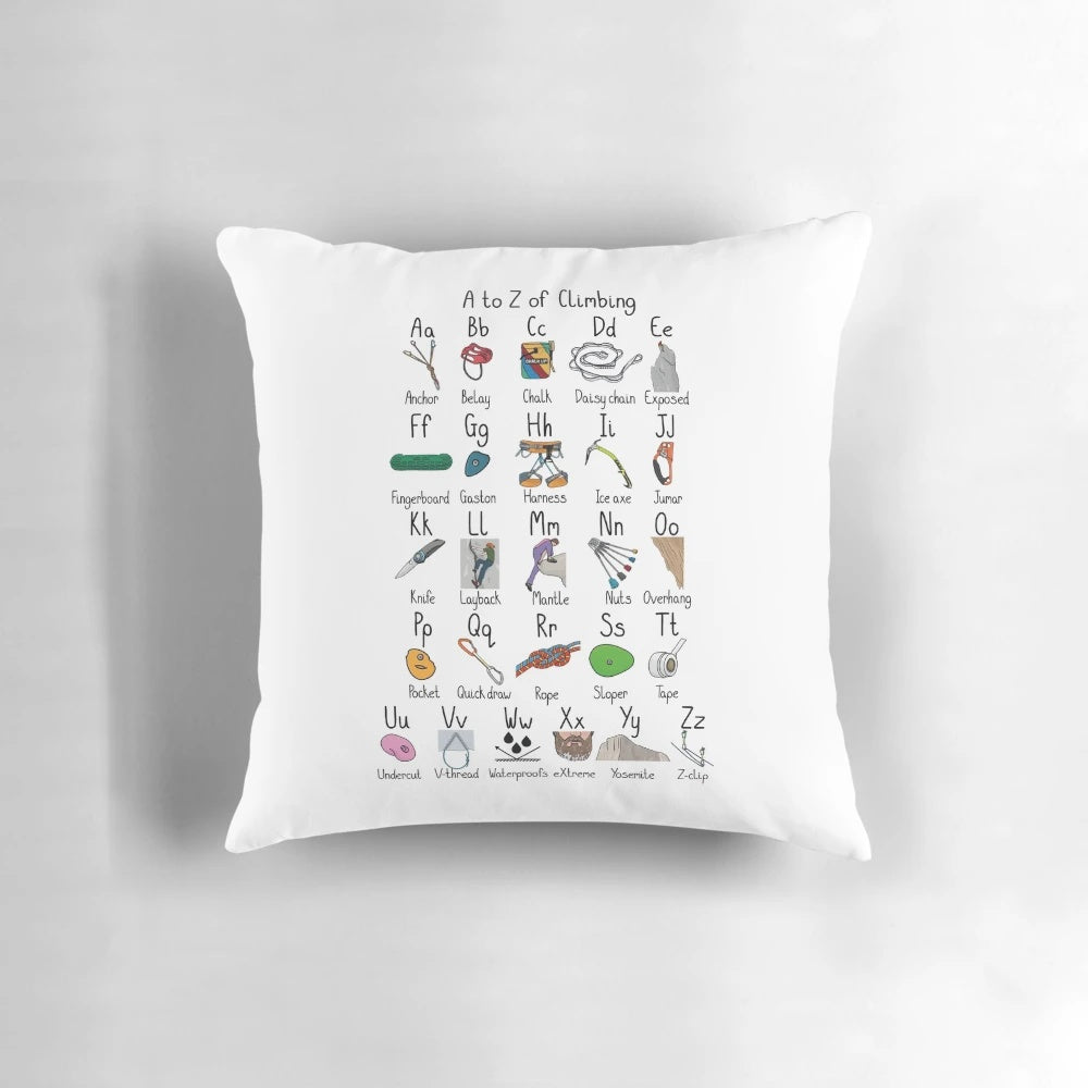 A decorative pillow featuring the alphabet in a climbing-inspired design, perfect for rock climbing enthusiasts.