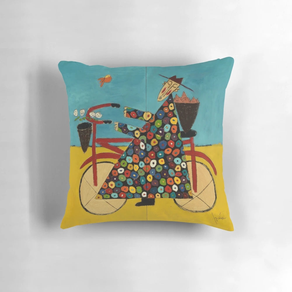 A colorful bicycle-themed pillow with a Buddhist monk design, perfect for coastal or beach-inspired decor.