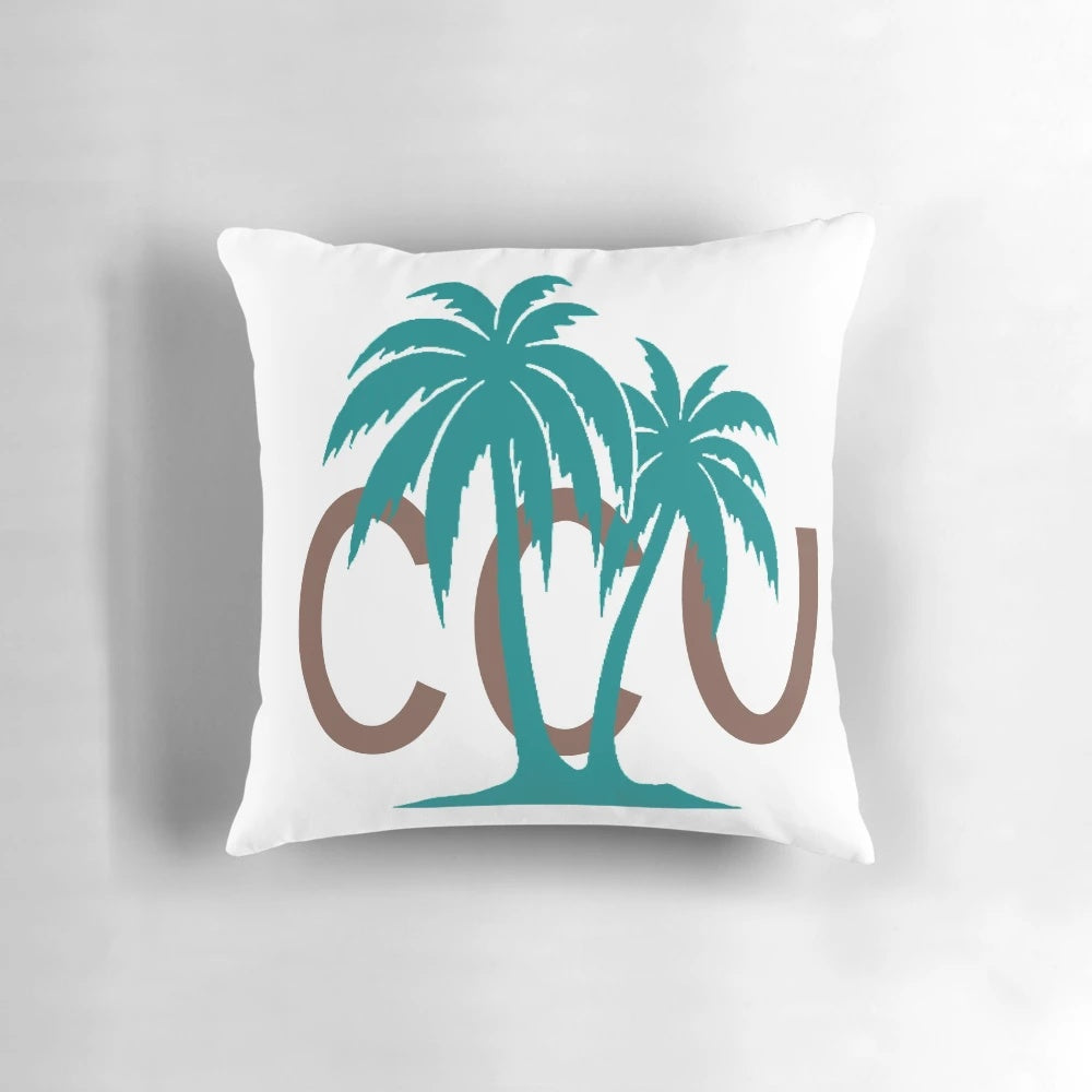 Coastal Carolina themed pillow with palm trees and Chanticleers logo
