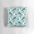 Oyster catcher pattern decorative pillow with black and white bird design on a blue background