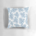 Decorative throw pillow featuring a watercolor-style blue sea fan coral pattern, perfect for coastal-inspired home decor.