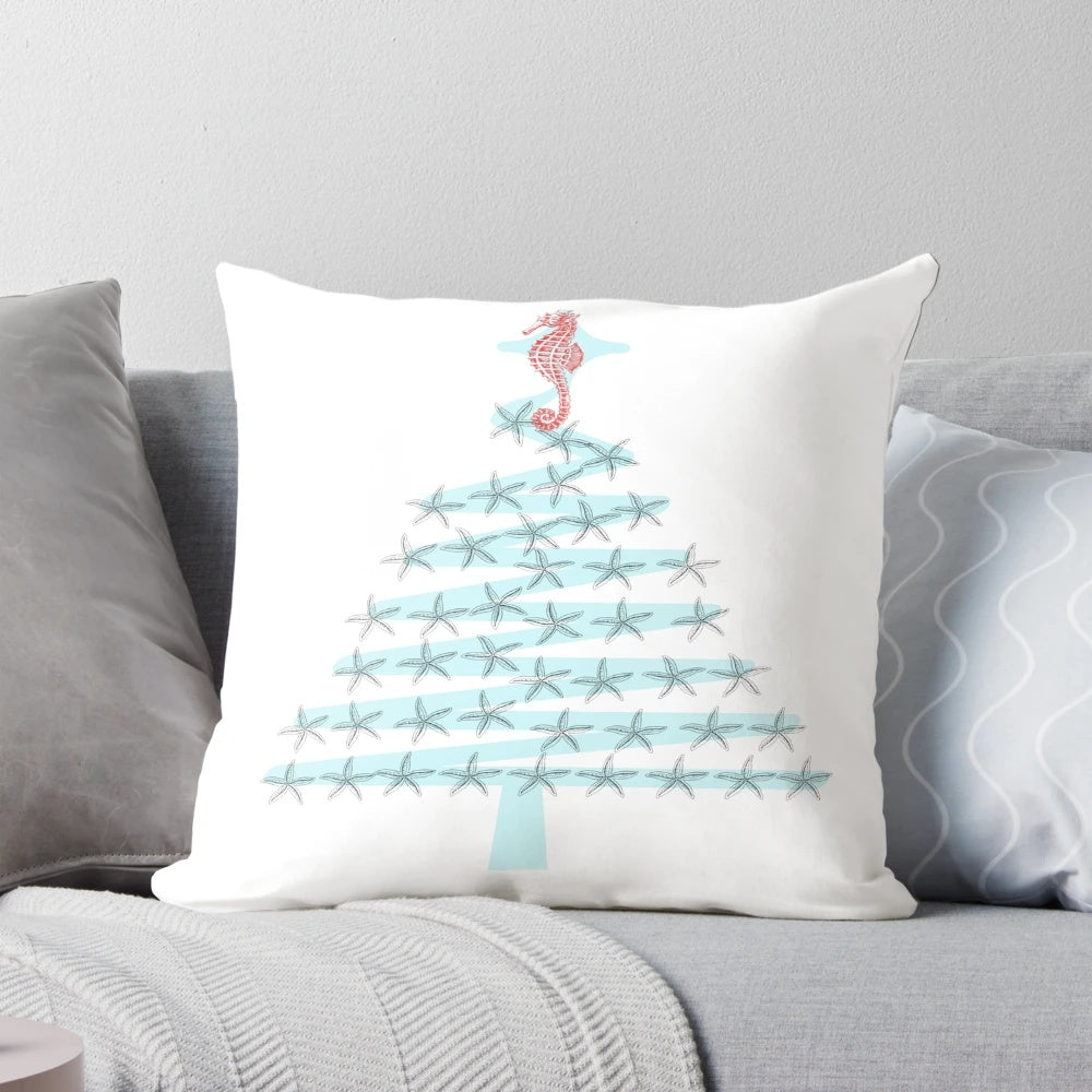Coastal-inspired Christmas pillow with starfish, seahorse, and ocean-themed design