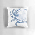 Coastal crab in watercolor art design on a navy blue throw pillow for beach-inspired home decor.