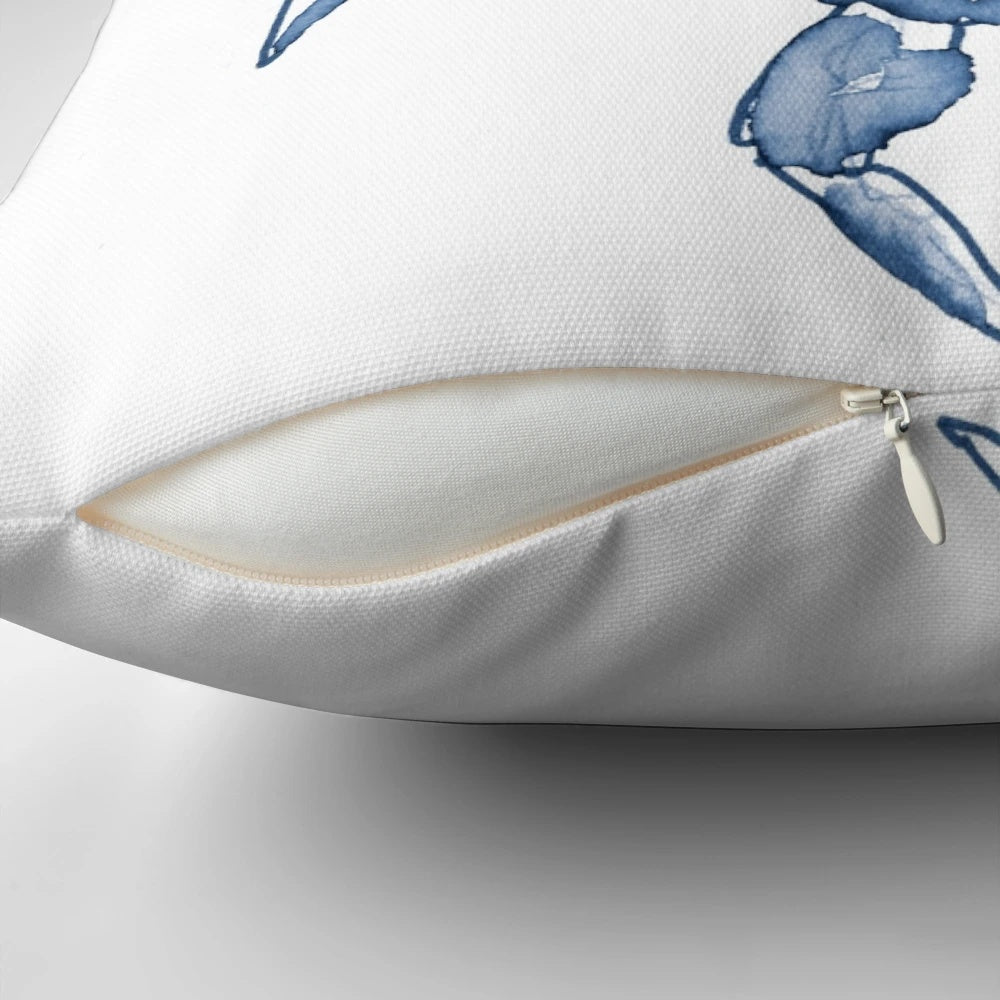 Coastal crab in watercolor art design on a navy blue throw pillow for beach-inspired home decor.