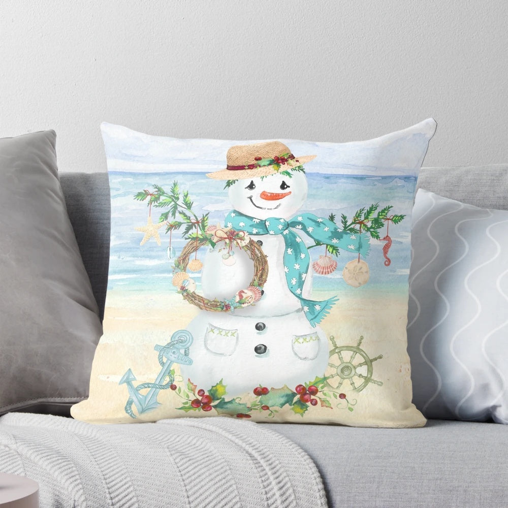 Coastal-themed Christmas pillow with seashells, starfish, and other nautical elements