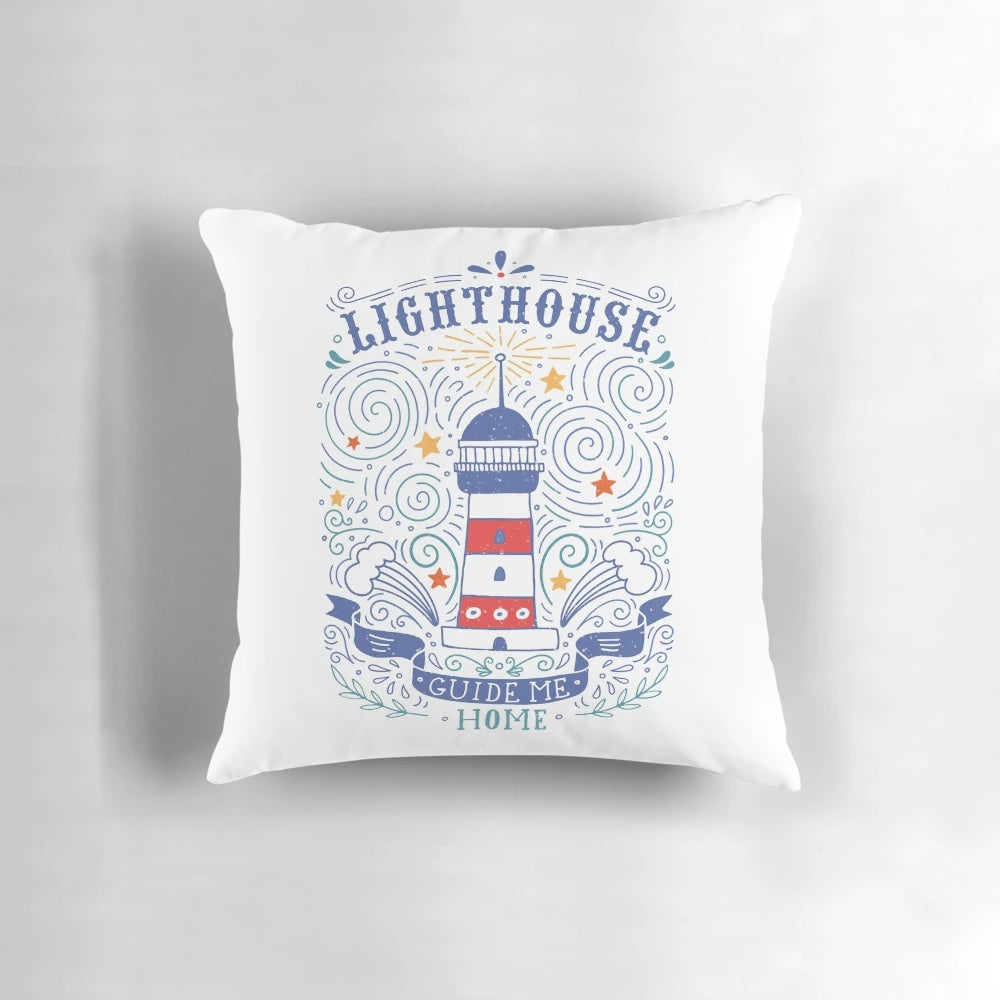 Closeup of a decorative pillow featuring a lighthouse illustration with hand-lettered coastal quote
