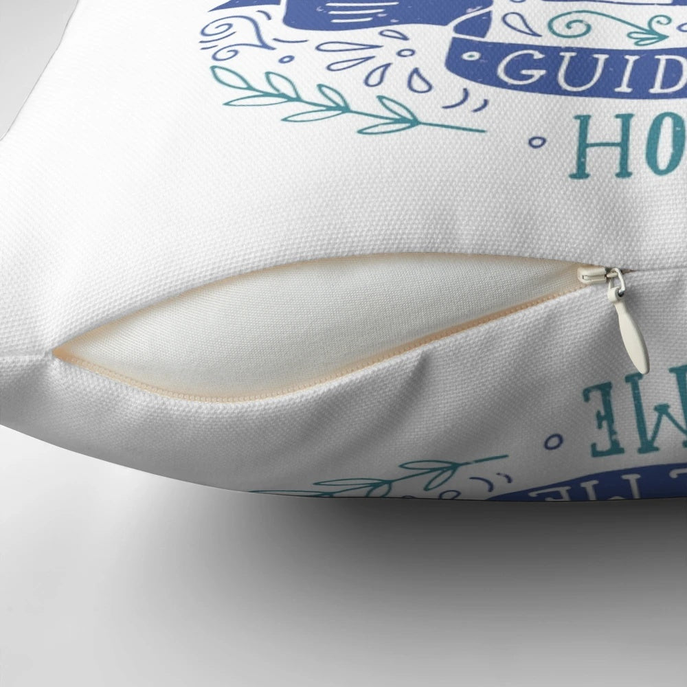 Closeup of a decorative pillow featuring a lighthouse illustration with hand-lettered coastal quote