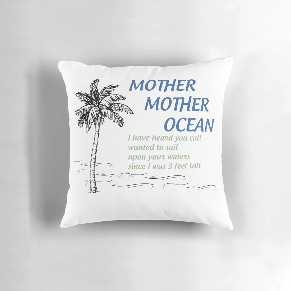 Coastal-themed pillow with ocean waves and parrothead imagery