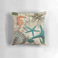 Coastal-themed decorative throw pillow with teal, starfish, and seahorse design