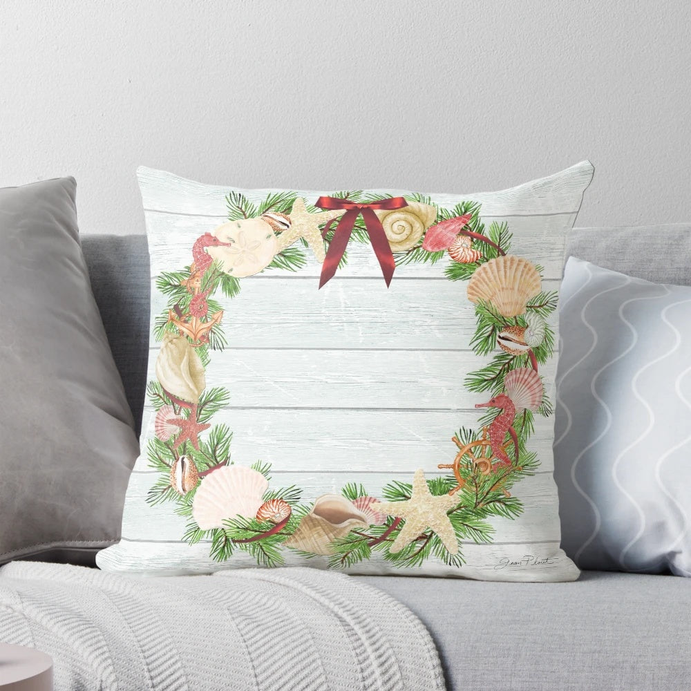 Coastal-themed Christmas decorative pillow with various nautical and holiday elements