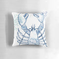 A watercolor painting of a coastal lobster in shades of blue and white, featured on a decorative throw pillow.