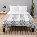 Cobalt blue plush blanket featuring a classic boat cruiser design