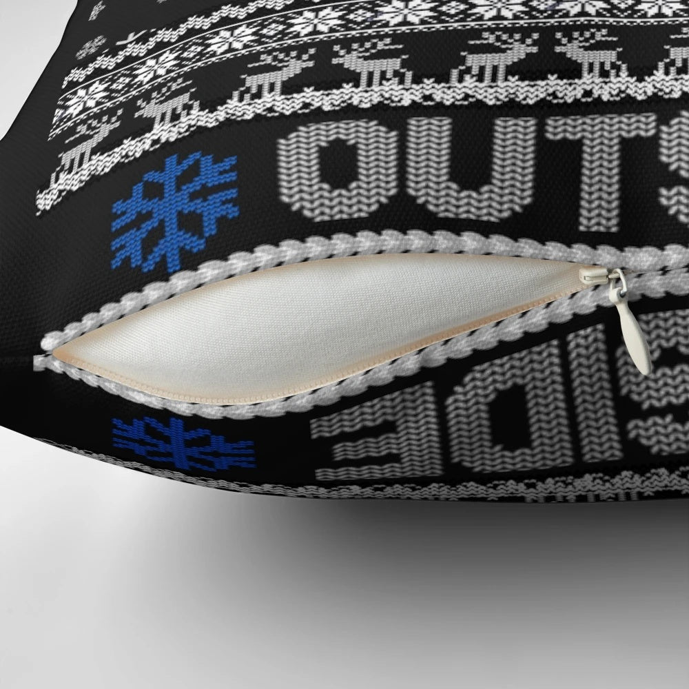 A cozy and festive pillow featuring the phrase "It's Cold Outside" with Cole Palmer's name and holiday designs.