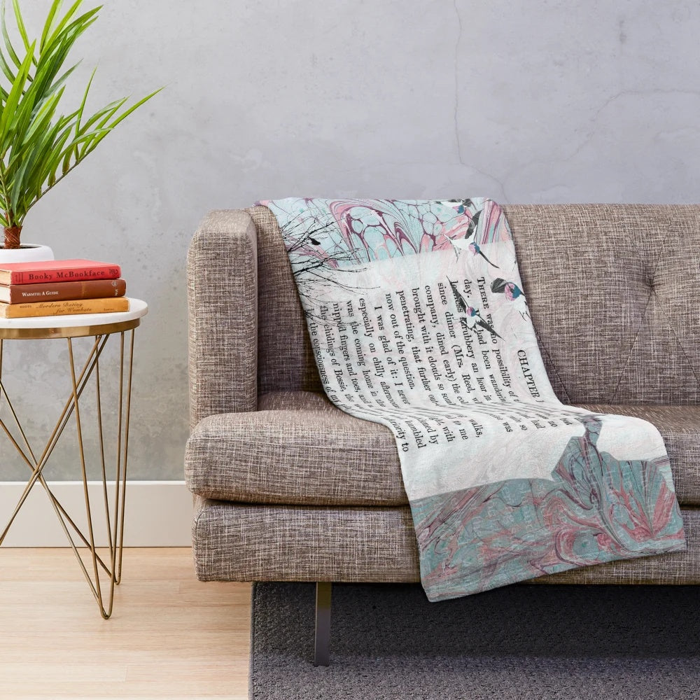 Collage-inspired Jane Eyre plush blanket featuring elements from the classic novel