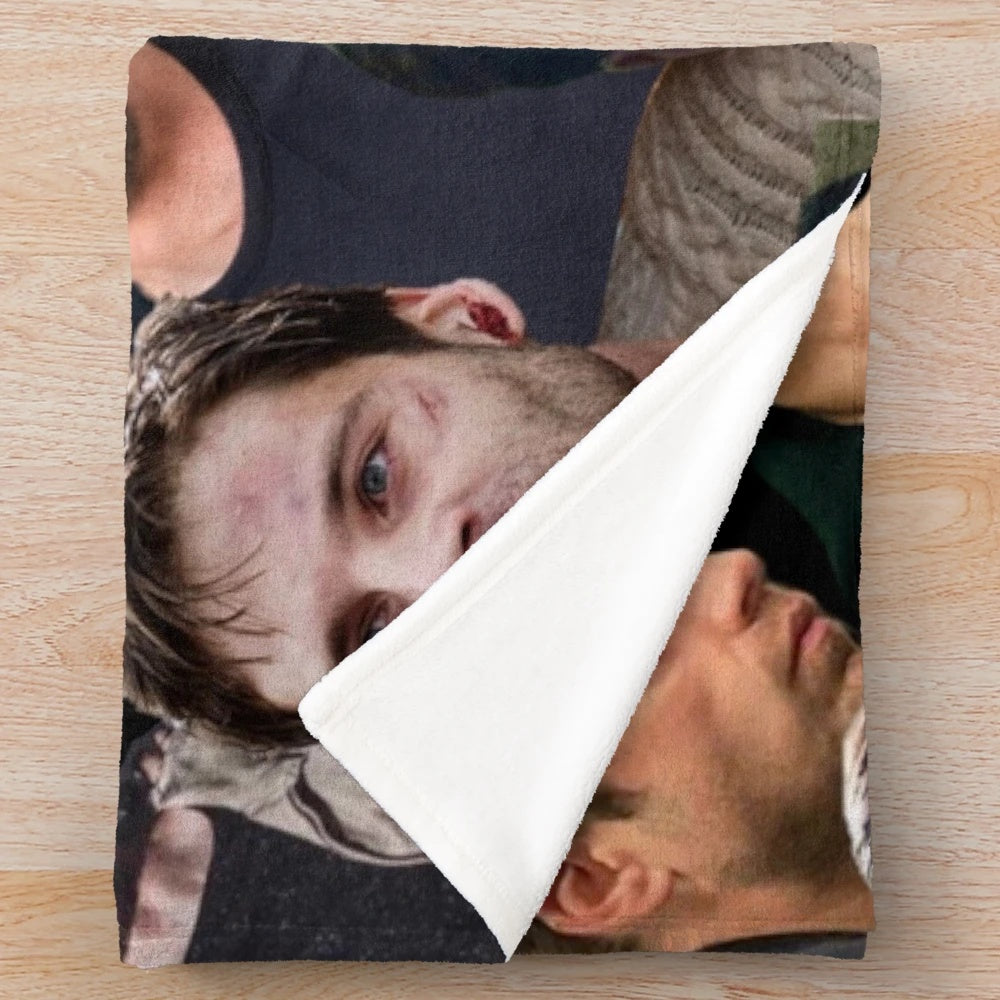 Plush blanket with collage design of Chris Evans and Sebastian Stan as Bucky Barnes and Steve Rogers