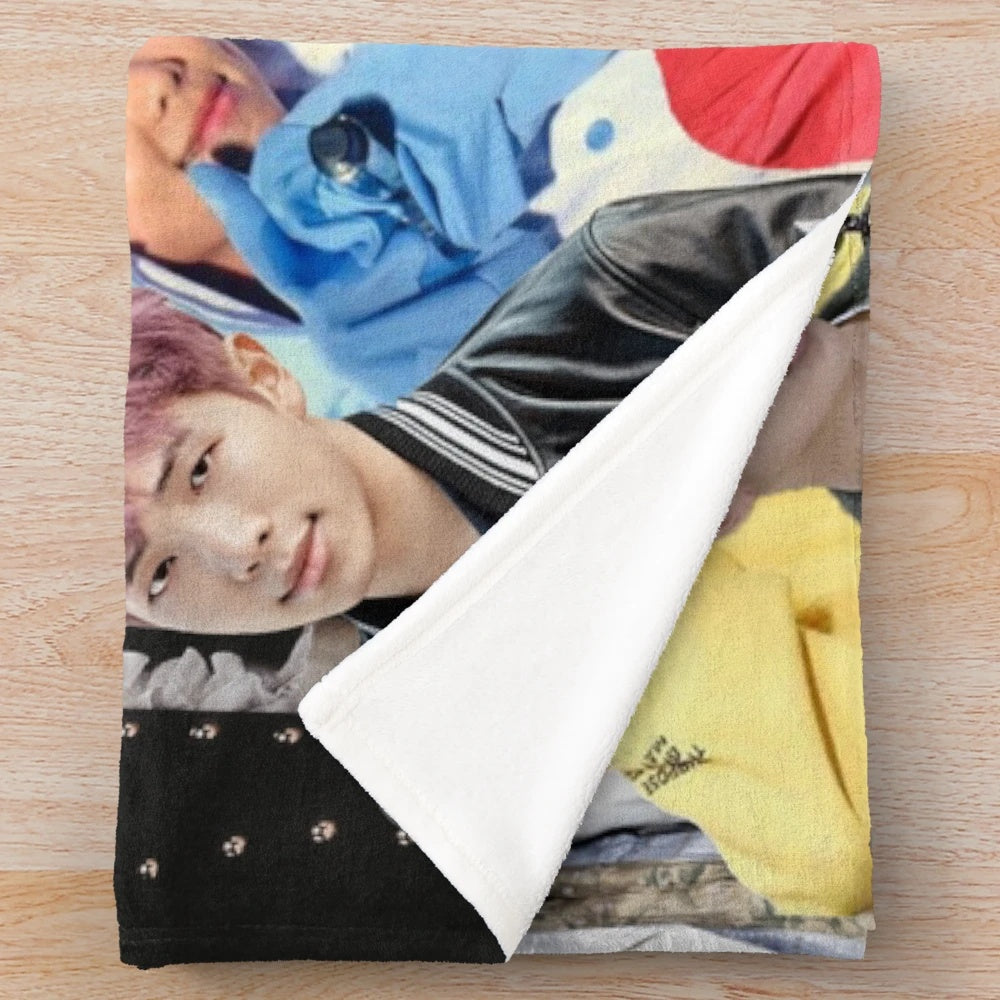 Collage-style plush blanket featuring RM from the popular K-pop group BTS