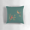 A beautifully crafted cardinal couple pillow featuring a male and female cardinal perched on autumn leaves.
