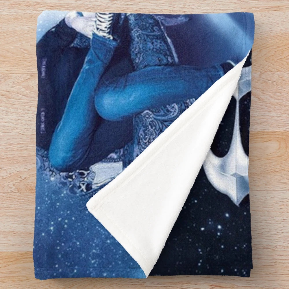 Plush blanket featuring logo and imagery of popular European rock band