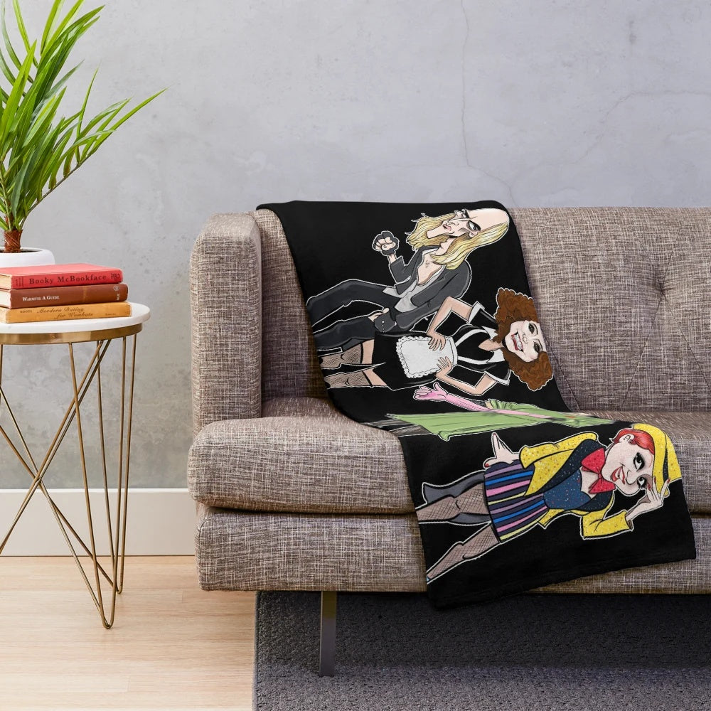 Rocky Horror Picture Show inspired plush blanket featuring caricatures of the main characters