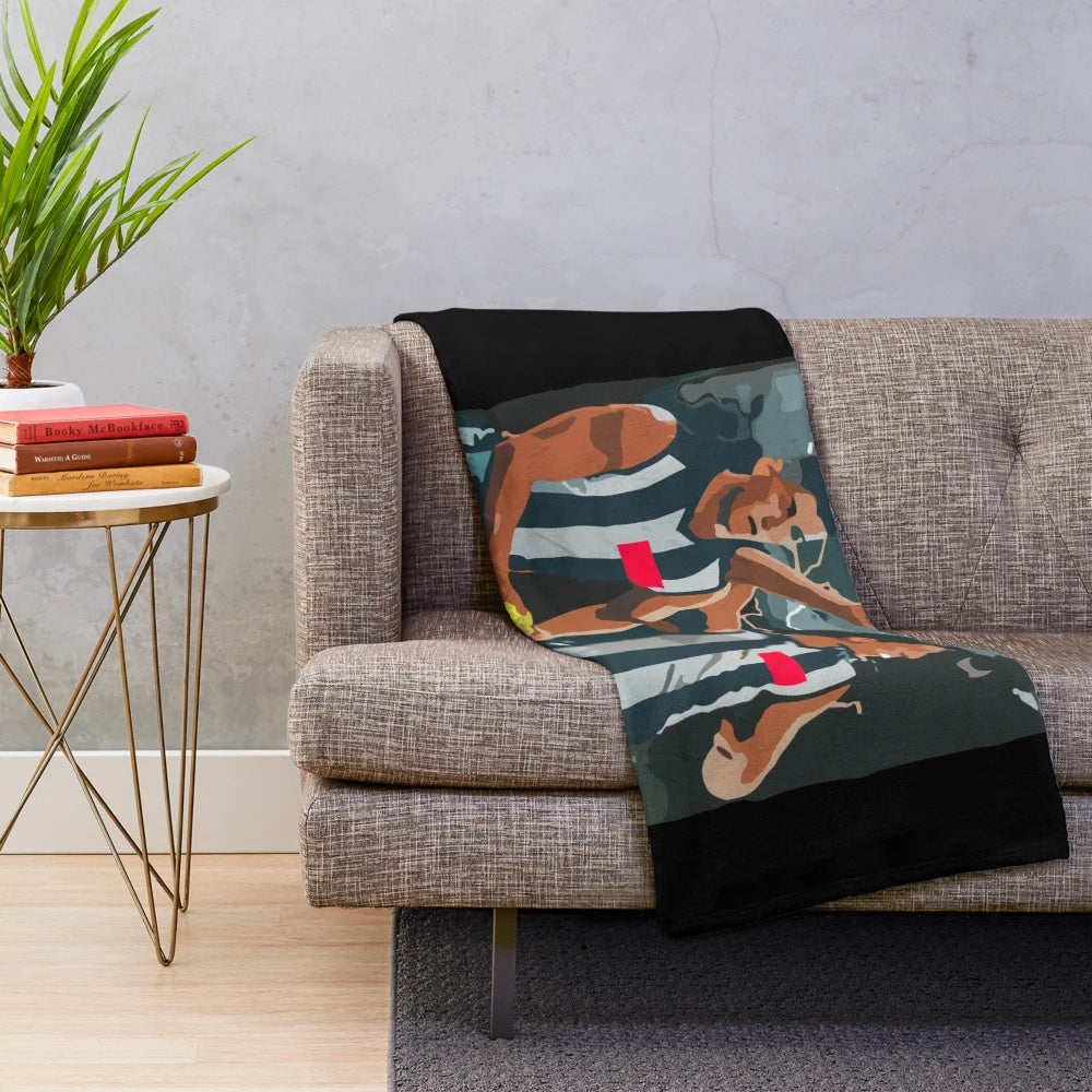 Collingwood-inspired plush blanket featuring the Magpies' logo and colors