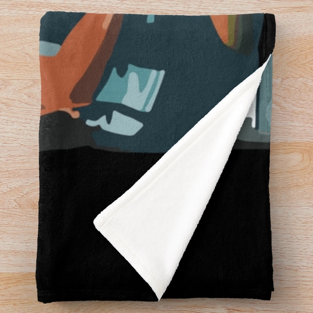 Collingwood-inspired plush blanket featuring the Magpies' logo and colors