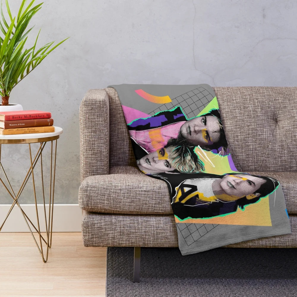 Vibrant 80s-style plush blanket with bold colors and retro music-inspired patterns