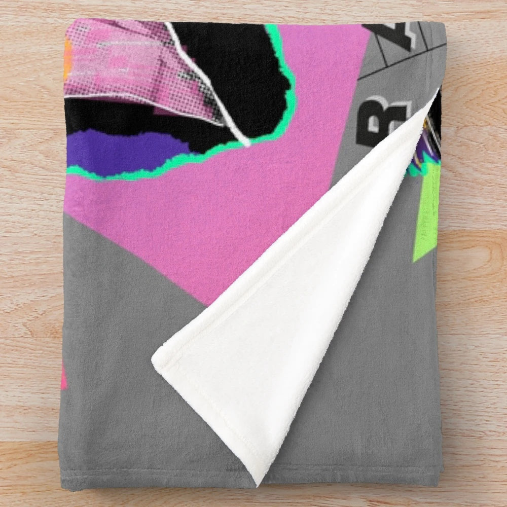 Vibrant 80s-style plush blanket with bold colors and retro music-inspired patterns