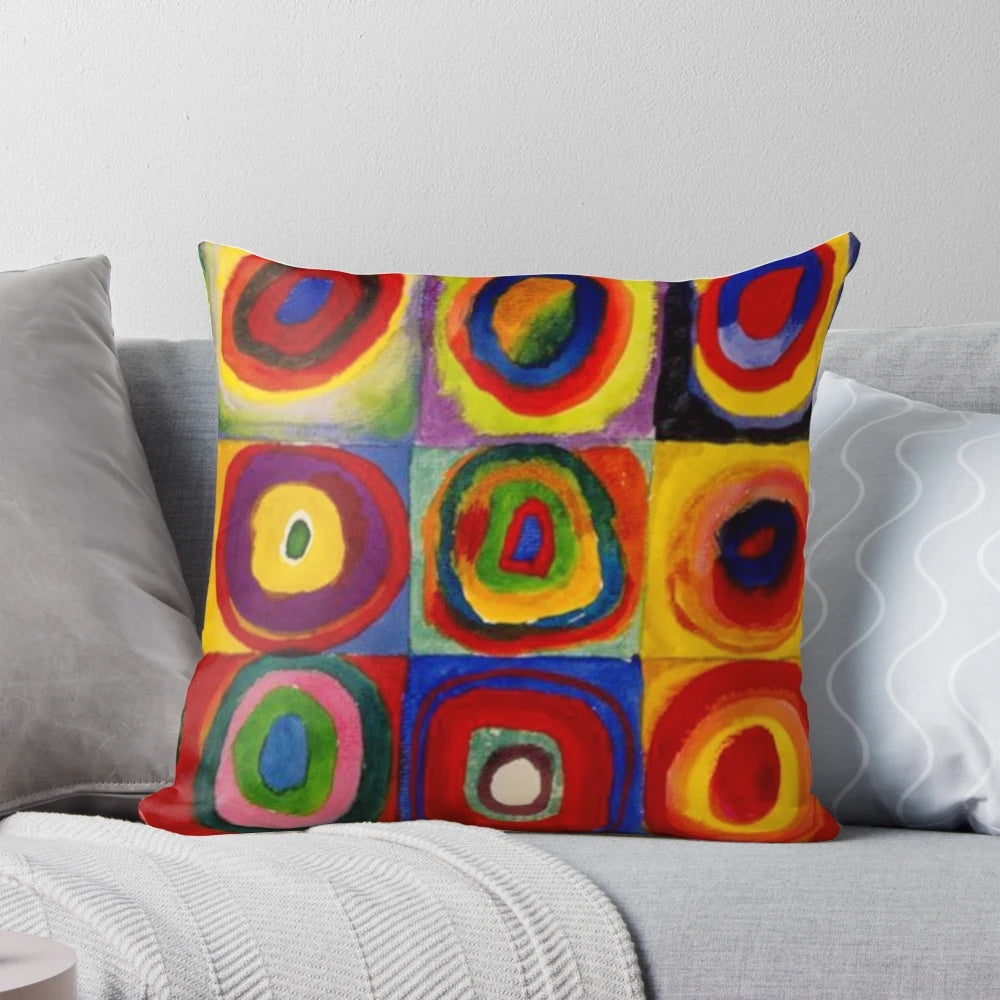 Kandinsky inspired abstract art pillow with vibrant concentric circles
