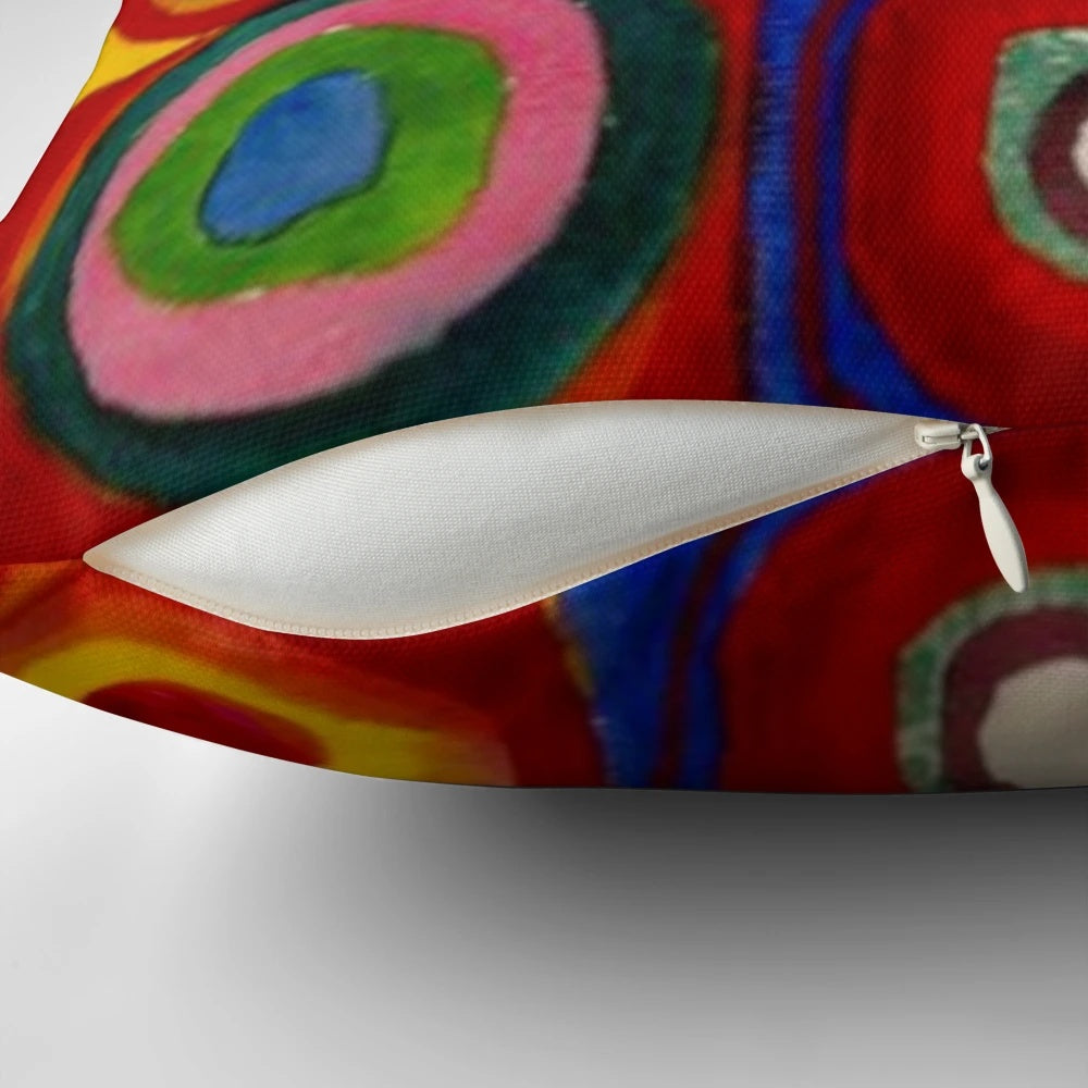 Kandinsky inspired abstract art pillow with vibrant concentric circles