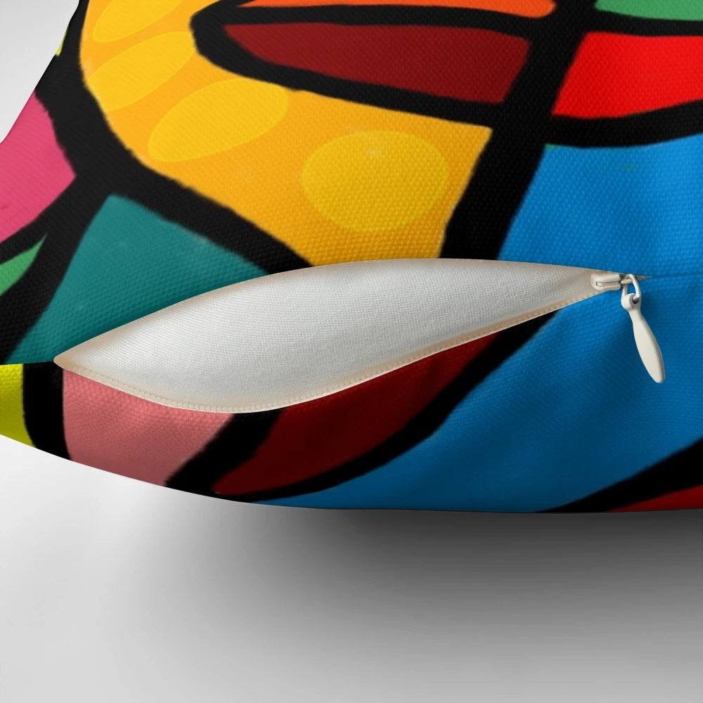 Vibrant abstract face design pillow in a modern cubist style