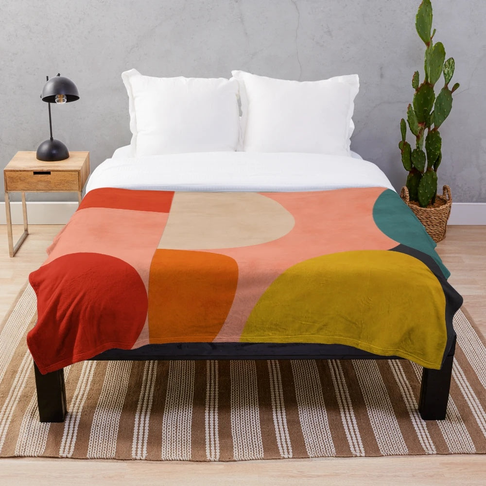 Colorful abstract geometric pattern on a soft plush blanket