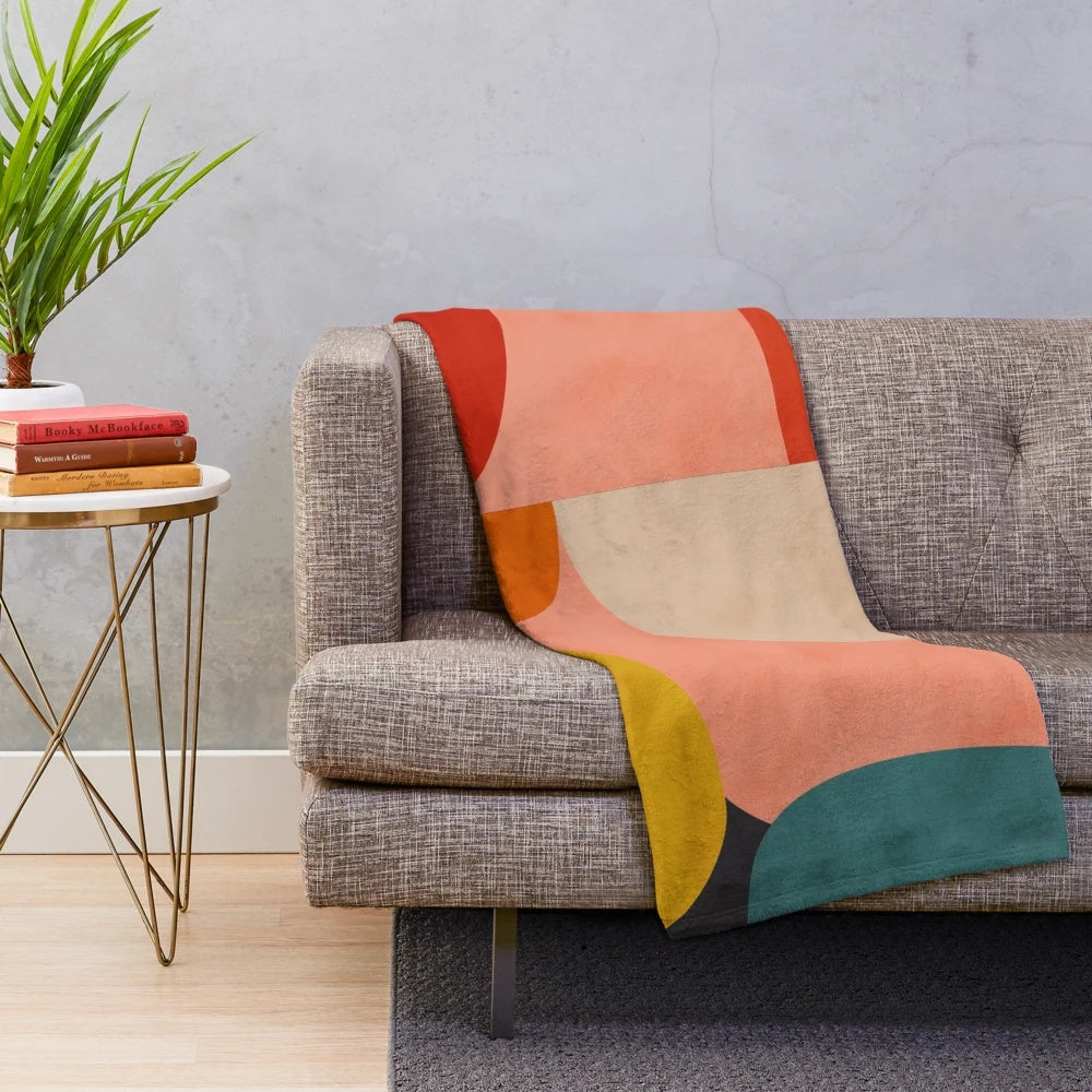 Colorful abstract geometric pattern on a soft plush blanket
