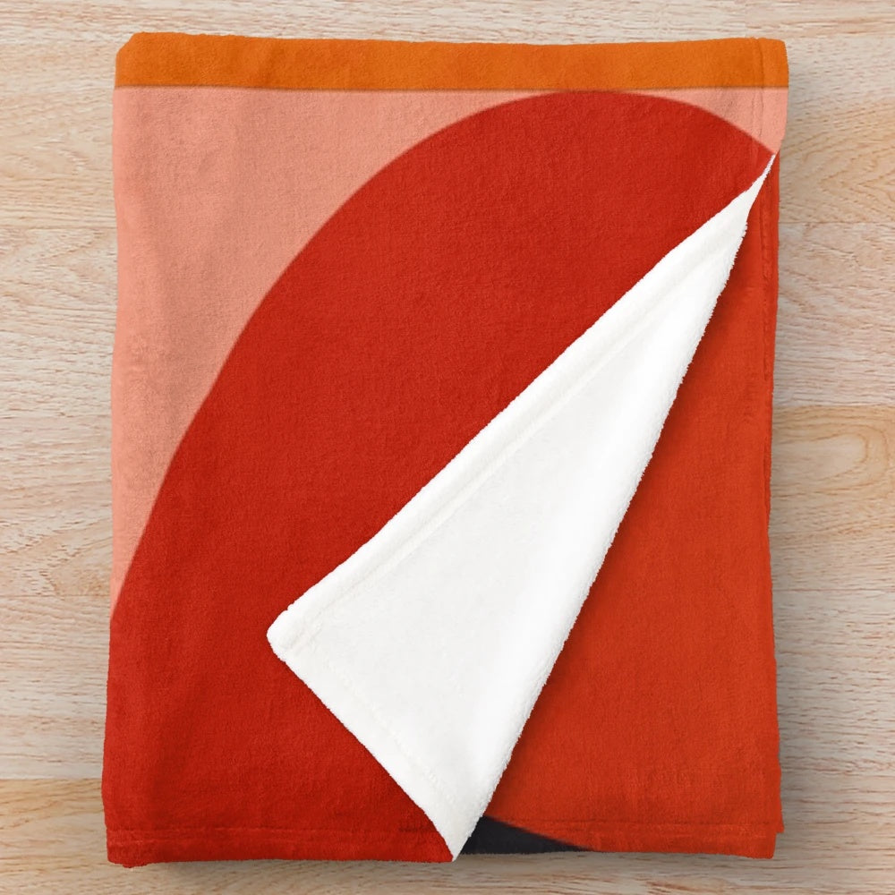 Colorful abstract geometric pattern on a soft plush blanket